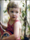 Three-year-old Justin with his toy guitar