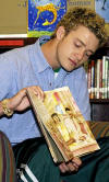 Justin partipates in the Knicks Reading Zone program at a charter school in Brooklyn, NY. (Early 2002)
