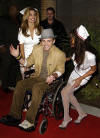 Justin & his 'nurses' arrive at the 2002 Billboard Music Awards show at the MGM Grand Garden Arena in Las Vegas, NV. (Dec. 9, 2002)