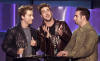 Lance, Joey, & Chris accept one of their two awards during the Radio Music Awards.  (Nov. 4, 2000)