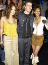 Justin with Jennifer Lopez and Halle Berry on Total Request Live. (Nov. 5, 2002)
