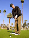 Justin golfing.  (2002)