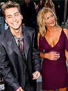 Lance poses with actress Kristy Swanson during a screening of the HBO miniseries "Band of Brothers," at the Hollywood Bowl August 29, 2001 in Los Angeles.