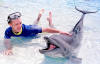 Justin swims with dolphins at Orlando's Discovery Cove. (Sept. 24, 2001)